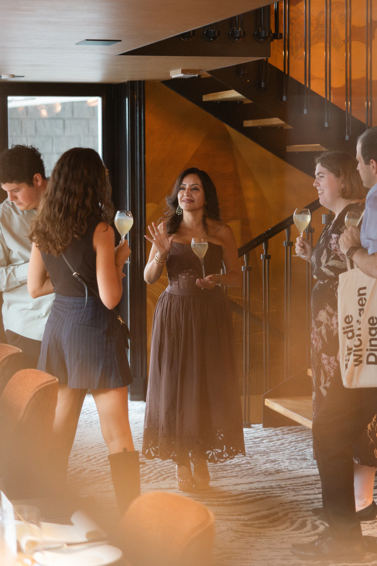 Guests arriving in the doorway of the restaurant