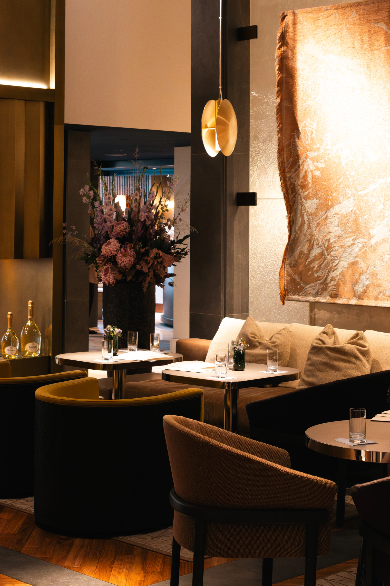 The dining room, with flowers and champagne set out on the tables